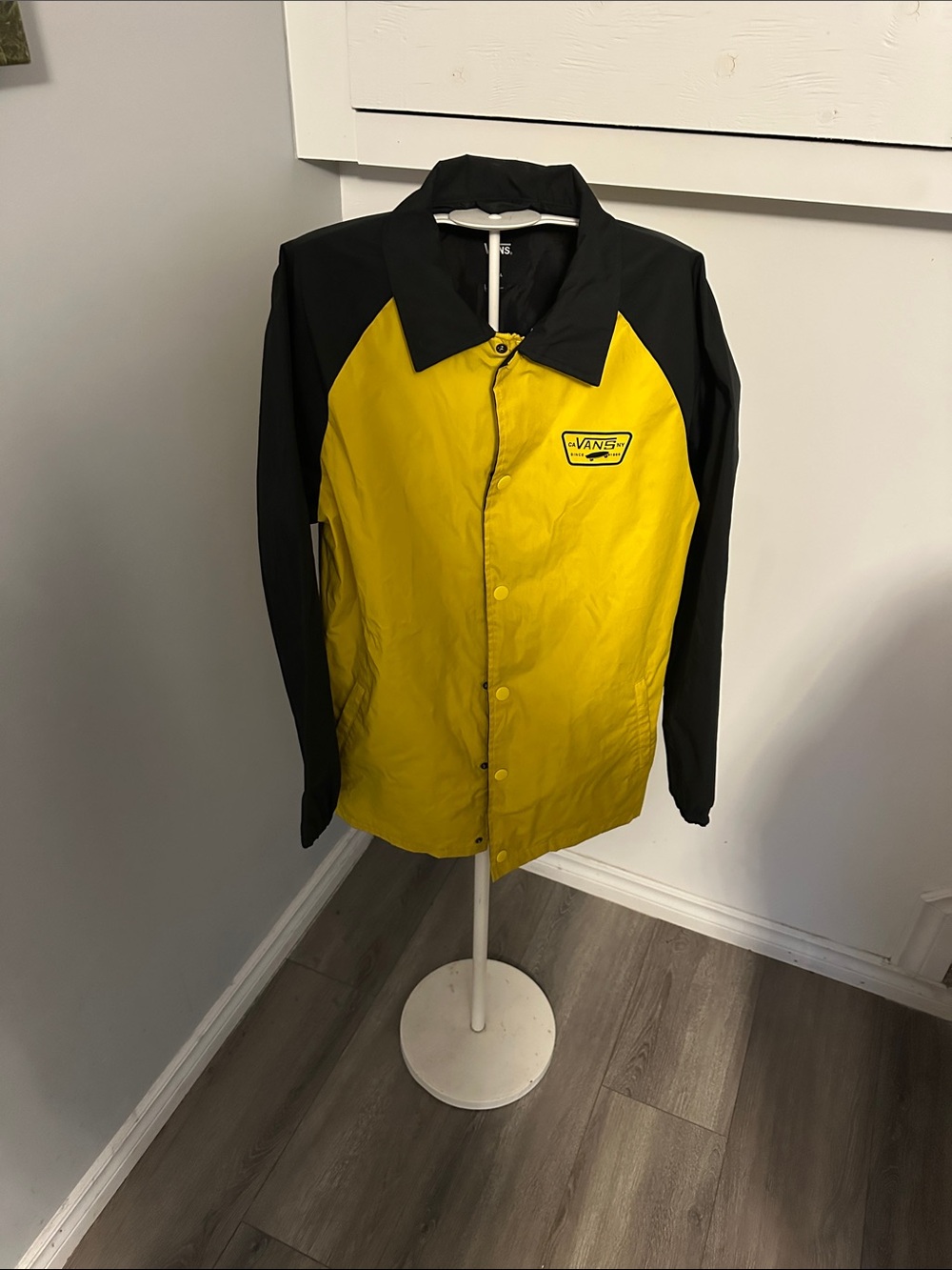 Vans Torrey MTE rain jacket featuring a snap-front coach jacket design